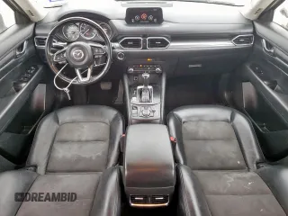 2020 Mazda CX-5 Touring z VIN JM3KFACM6L0787687, wystawiony jako Copart lot #57639555 z przebiegiem 91 219 mil mil oraz Szkoda całkowita • Salvage title. Historia ofert i sprzedaży dostępna na DreamBid. Obrazek 8.