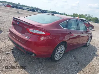 2013 Ford Fusion Titanium with VIN 3FA6P0D98DR333167, listed as a IAAI auction lot 39914722 with 200,851 mi miles. Bid and sale history available at carsss.com. Image 4.