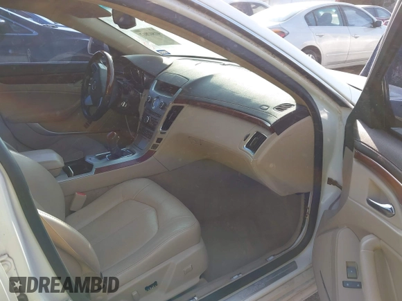 2009 Cadillac CTS AWD z VIN 1G6DT57VX90140080, wystawiony jako IAAI lot #41802817 z przebiegiem 146 978 mil mil oraz . Historia ofert i sprzedaży dostępna na DreamBid. Obrazek 5.