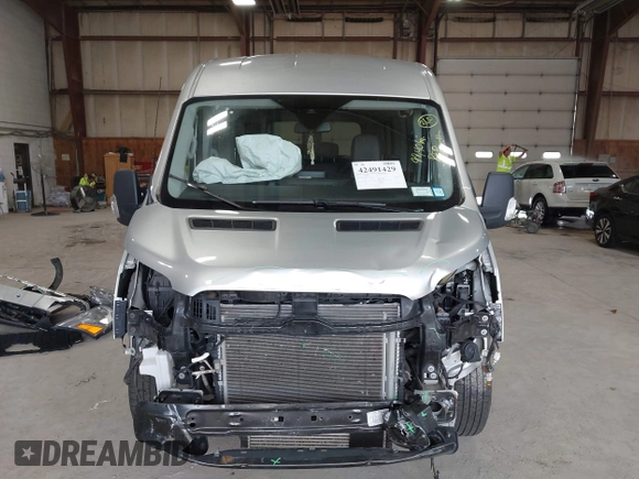 2021 Ford Transit Passenger XL с VIN 1FBAX9CG9MKA15625, выставлен на аукционе IAAI как лот 42491429 с пробегом 99 401 миль миль и . История ставок и продаж доступна на DreamBid. Изображение 13.