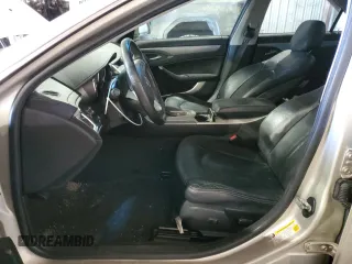 2013 Cadillac CTS Performance with VIN 1G6DK5E30D0157791, listed as a Copart auction lot 83798544 with 124,638 mi miles and Salvage Title. Bid and sale history available at DreamBid. Image 7.