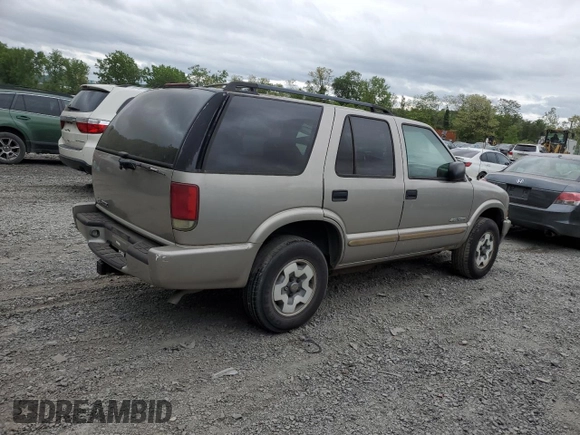2004 Chevrolet Blazer LS z VIN 1GNDT13X84K162807, wystawiony jako Copart lot #57154205 z przebiegiem 82 732 mil mil oraz Czysty tytuł • Clean title. Historia ofert i sprzedaży dostępna na DreamBid. Obrazek 3.