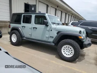 2023 Jeep Wrangler Sport with VIN 1C4HJXDN0PW643485, listed as a Copart auction lot 59783564 with 14,001 mi miles and Salvage Title. Bid and sale history available at DreamBid. Image 4.