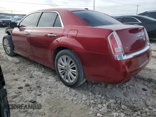 2012 Chrysler 300 C with VIN 2C3CCAKT3CH197140, listed as a Copart auction lot 82628384 with 167,304 mi miles and Salvage Title. Bid and sale history available at DreamBid. Image 2.