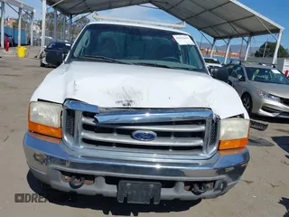 2001 Ford Super Duty F-250 XL with VIN 1FTNX20S11EA60775, listed as a IAAI auction lot 41631692 with 151,485 mi miles. Bid and sale history available at carsss.com. Image 12.
