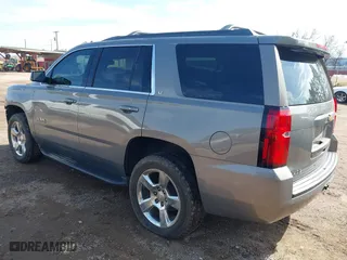 2017 Chevrolet Tahoe LT with VIN 1GNSCBKC2HR260627, listed as a IAAI auction lot 41580613 with 156,650 mi miles. Bid and sale history available at carsss.com. Image 3.