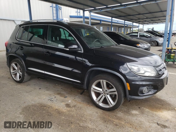 2015 Volkswagen Tiguan R-Line with VIN WVGAV7AX3FW064500, listed as a Copart auction lot 54745215 with 103,406 mi miles and Salvage Title. Bid and sale history available at DreamBid. Image 4.