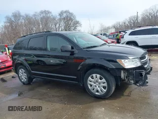 2019 Dodge Journey SE with VIN 3C4PDCBB8KT844800, listed as a IAAI auction lot 41721062 with 148,390 mi miles and . Bid and sale history available at DreamBid. Image 14.