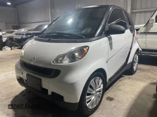 2012 Smart fortwo Pure z VIN WMEEJ3BA5CK540092, wystawiony jako Copart lot #51878135 z przebiegiem 59 356 mil mil oraz Szkody całkowita. Historia ofert i sprzedaży dostępna na DreamBid. Obrazek 2.