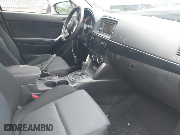 2014 Mazda CX-5 Sport with VIN JM3KE4BE3E0300849, listed as a IAAI auction lot 41942418 with 144,310 mi miles. Bid and sale history available at carsss.com. Image 5.