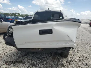 2023 Toyota Tacoma SR5 z VIN 3TYAZ5CN7PT042367, wystawiony jako Copart lot #60100495 z przebiegiem Nie podano mil oraz Nie do naprawy • Non repairable. Historia ofert i sprzedaży dostępna na DreamBid. Obrazek 6.