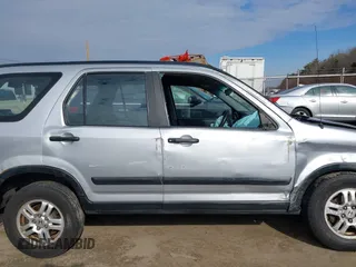 2002 Honda CR-V LX z VIN JHLRD78532C050707, wystawiony jako IAAI lot #41704967 z przebiegiem 306 564 mil mil oraz . Historia ofert i sprzedaży dostępna na DreamBid. Obrazek 14.