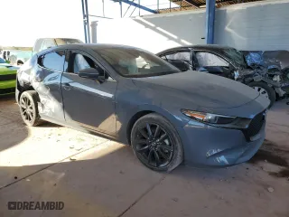 2019 Mazda Mazda3 Hatchback w/Premium Pkg with VIN JM1BPBNM9K1125071, listed as a Copart auction lot 86589954 with 63,157 mi miles and Salvage Title. Bid and sale history available at carsss.com. Image 4.