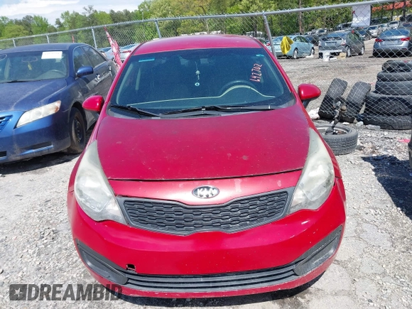 2015 Kia Rio LX with VIN KNADM4A33F6427021, listed as a IAAI auction lot 42011458 with 184,738 mi miles. Bid and sale history available at carsss.com. Image 6.