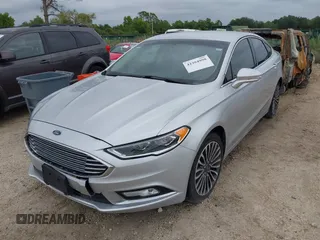 2017 Ford Fusion SE z VIN 3FA6P0HD5HR166433, wystawiony jako IAAI lot #42394998 z przebiegiem 121 333 mil mil oraz . Historia ofert i sprzedaży dostępna na DreamBid. Obrazek 19.