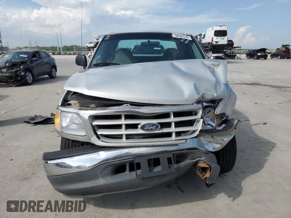 1999 Ford F-150 with VIN 1FTZX1729XNB67194, listed as a Copart auction lot 58383345 with Not provided miles and Salvage title. Bid and sale history available at DreamBid. Image 5.