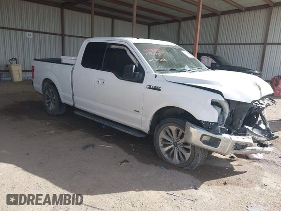 2015 Ford F-150 XL with VIN 1FTEX1CP0FKE84653, listed as a IAAI auction lot 41794451 with 156,552 mi miles. Bid and sale history available at carsss.com. Image 1.