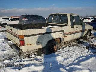 1984 Toyota Pickup z VIN JT4RN56S0E0003177, wystawiony jako Copart lot #48304385 z przebiegiem 117 297 mil mil oraz Szkoda całkowita • Salvage title. Historia ofert i sprzedaży dostępna na DreamBid. Obrazek 3.