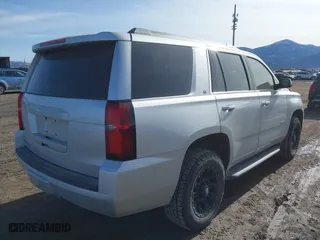 2019 Chevrolet Tahoe LT with VIN 1GNSKBKC4KR388622, listed as a IAAI auction lot 41643966 with 96,298 mi miles. Bid and sale history available at carsss.com. Image 4.