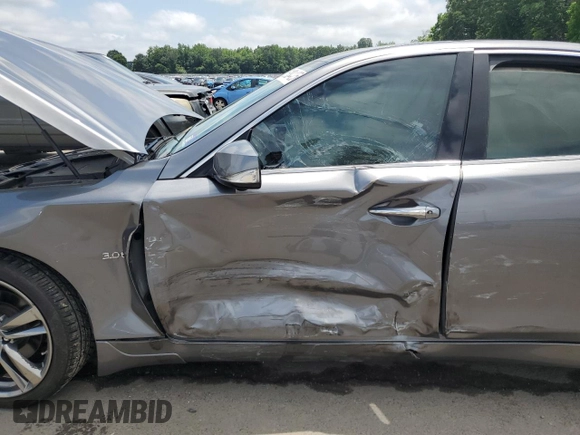 2019 Infiniti Q50 Luxe with VIN JN1EV7AR7KM591889, listed as a Copart auction lot 61304425 with 73,712 mi miles and Salvage title. Bid and sale history available at DreamBid. Image 7.