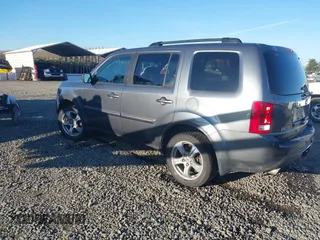2013 Honda Pilot EX-L with VIN 5FNYF4H55DB029204, listed as a IAAI auction lot 41676566 with 173,213 mi miles. Bid and sale history available at carsss.com. Image 3.