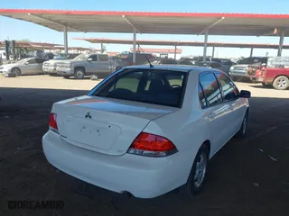 2004 Mitsubishi Lancer ES with VIN JA3AJ26E14U065498, listed as a IAAI auction lot 41887945 with 142,632 mi miles. Bid and sale history available at carsss.com. Image 4.