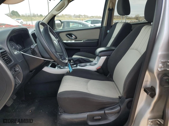 2007 Mercury Mariner Luxury with VIN 4M2YU91117KJ02032, listed as a Copart auction lot 50418815 with 128,498 mi miles and Salvage Title. Bid and sale history available at carsss.com. Image 7.