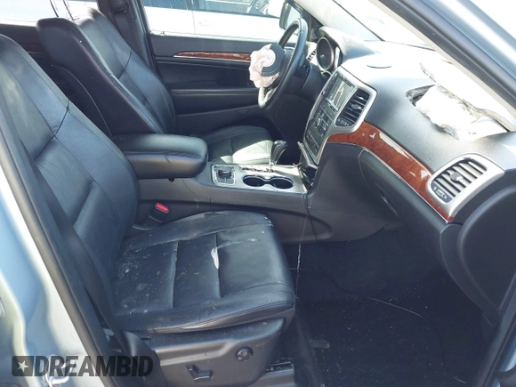 2012 Jeep Grand Cherokee Limited z VIN 1C4RJFBTXCC341813, wystawiony jako IAAI lot #41791662 z przebiegiem 120 811 mil mil oraz . Historia ofert i sprzedaży dostępna na DreamBid. Obrazek 5.