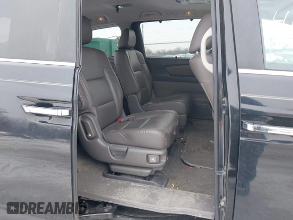 2015 Honda Odyssey EX-L with VIN 5FNRL5H60FB018030, listed as a IAAI auction lot 41608357 with 166,214 mi miles and . Bid and sale history available at carsss.com. Image 8.