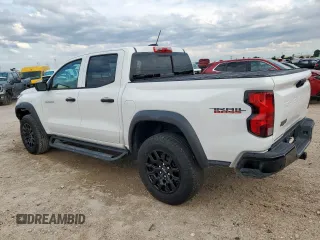 2024 Chevrolet Colorado 4WD Trail Boss z VIN 1GCPTEEK9R1161760, wystawiony jako Copart lot #58703945 z przebiegiem Nie podano mil oraz Szkoda całkowita • Salvage title. Historia ofert i sprzedaży dostępna na DreamBid. Obrazek 2.