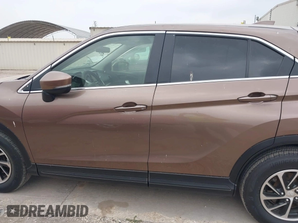2020 Mitsubishi Eclipse Cross ES z VIN JA4AS3AAXLZ021438, wystawiony jako IAAI lot #41900181 z przebiegiem 91 306 mil mil oraz . Historia ofert i sprzedaży dostępna na DreamBid. Obrazek 14.