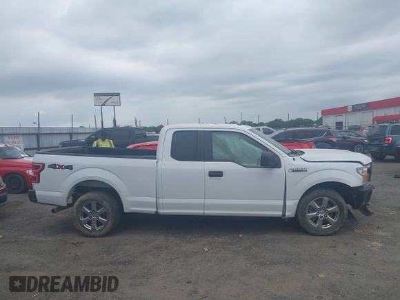 2018 Ford F-150 XL with VIN 1FTEX1EP1JKF66557, listed as a IAAI auction lot 42099567 with 126,516 mi miles and . Bid and sale history available at DreamBid. Image 13.
