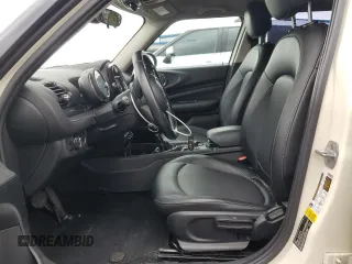 2016 MINI Clubman z VIN WMWLN5C58G2E30988, wystawiony jako Copart lot #48992025 z przebiegiem 108 620 mil mil oraz Czysty tytuł • Clean title. Historia ofert i sprzedaży dostępna na DreamBid. Obrazek 7.