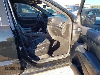 2021 Jeep Grand Cherokee 80th Anniversary with VIN 1C4RJFBG9MC527654, listed as a IAAI auction lot 41212055 with 92,436 mi miles and . Bid and sale history available at DreamBid. Image 5.