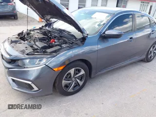 2020 Honda Civic LX with VIN 2HGFC2F65LH575320, listed as a IAAI auction lot 42009564 with Not Provided miles and . Bid and sale history available at DreamBid. Image 17.