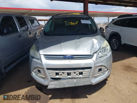 2013 Ford Escape SE with VIN 1FMCU0GX9DUB83512, listed as a IAAI auction lot 41970256 with 69,897 mi miles and . Bid and sale history available at DreamBid. Image 6.