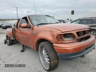 1999 Ford F-150 XL with VIN 1FTRX08L7XKB50493, listed as a Copart auction lot 79948554 with Not provided miles and Non repairable. Bid and sale history available at DreamBid. Image 4.