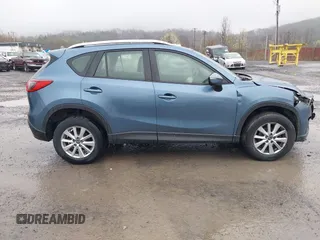 2016 Mazda CX-5 Sport with VIN JM3KE4BY5G0727608, listed as a IAAI auction lot 41975279 with 95,817 mi miles and . Bid and sale history available at carsss.com. Image 13.