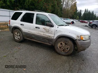 2001 Ford Escape XLT with VIN 1FMYU04181KC55393, listed as a Copart auction lot 76321074 with 223,327 mi miles and Salvage Title. Bid and sale history available at carsss.com. Image 4.