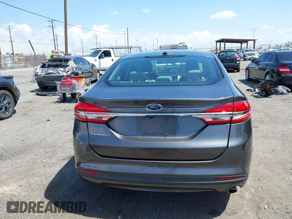 2017 Ford Fusion S with VIN 3FA6P0G73HR343623, listed as a IAAI auction lot 41957903 with 100,544 mi miles. Bid and sale history available at carsss.com. Image 16.