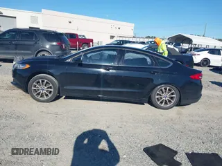 2017 Ford Fusion SE with VIN 3FA6P0HD9HR137825, listed as a IAAI auction lot 41737647 with 128,545 mi miles and . Bid and sale history available at DreamBid. Image 14.