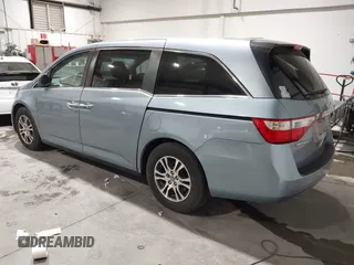 2011 Honda Odyssey EX with VIN 5FNRL5H44BB051539, listed as a IAAI auction lot 42119192 with 207,522 mi miles and . Bid and sale history available at carsss.com. Image 3.
