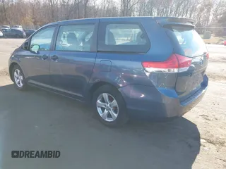 2014 Toyota Sienna L with VIN 5TDZK3DC0ES413970, listed as a IAAI auction lot 40870422 with 138,589 mi miles. Bid and sale history available at carsss.com. Image 3.