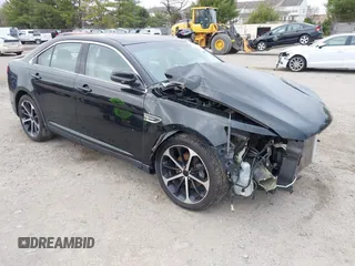 2016 Ford Taurus SEL z VIN 1FAHP2H80GG130887, wystawiony jako IAAI lot #41911575 z przebiegiem 138 469 mil mil oraz . Historia ofert i sprzedaży dostępna na DreamBid. Obrazek 1.