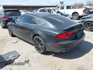 2015 Audi A7 3.0 TDI Premium Plus with VIN WAUWMAFC0FN029822, listed as a IAAI auction lot 41828754 with 148,847 mi miles. Bid and sale history available at carsss.com. Image 3.