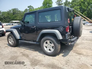 2016 Jeep Wrangler Black Bear z VIN 1C4AJWAG2GL330098, wystawiony jako Copart lot #59018845 z przebiegiem 84 039 mil mil oraz Szkoda całkowita • Salvage title. Historia ofert i sprzedaży dostępna na DreamBid. Obrazek 2.