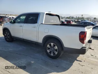 2017 Honda Ridgeline RTL-T with VIN 5FPYK2F65HB011097, listed as a Copart auction lot 63687965 with 186,157 mi miles and Salvage title. Bid and sale history available at DreamBid. Image 2.