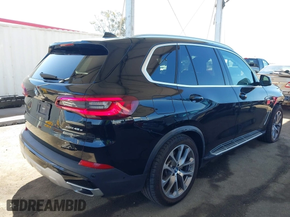 2023 BMW X5 xDrive45e z VIN 5UXTA6C01P9P71810, wystawiony jako IAAI lot #42014507 z przebiegiem 48 174 mil mil oraz . Historia ofert i sprzedaży dostępna na DreamBid. Obrazek 4.
