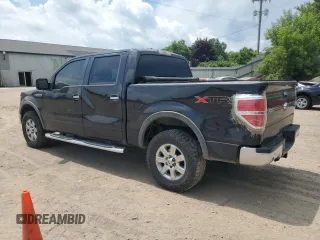 2014 Ford F-150 XL with VIN 1FTFW1EFXEFB04995, listed as a Copart auction lot 60883835 with 176,136 mi miles and Clean title. Bid and sale history available at DreamBid. Image 2.