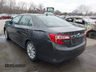 2012 Toyota Camry XLE z VIN 4T1BD1FK1CU048272, wystawiony jako IAAI lot #41711586 z przebiegiem 104 734 mil mil oraz . Historia ofert i sprzedaży dostępna na DreamBid. Obrazek 3.